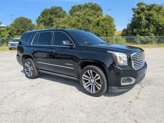 2020 GMC Yukon Denali in Onyx Black — front three-quarter view